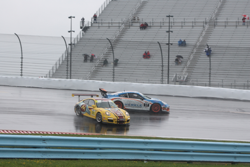 Illustration for article titled Standing Water Causes Mass 911 GT3 Cup Spin-Out At First Turn Of Race